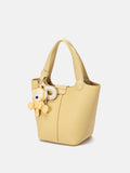 PAZZION, Haley Leather Charmed Bucket Bag, Yellow